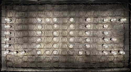 Rustic Industrial “LOVE” Wall-Mounted Light Installation – Made from a Vintage Bed Spring Frame