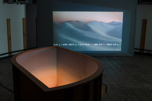 Haseeb Ahmed, Stock Weather II, 2022, 2008 Stock Data, wood, aluminum, 3D prints, software, electronics, projector or screen, and sand, 80 x 160 x 195 cm, 31 1/2 x 63 x 76 3/4 in.