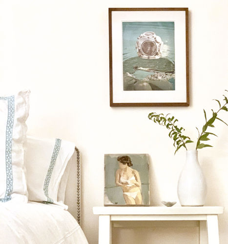 Bedside table with small painting by Gideon Rubin of a woman in her underwear with a collage of a diver by Jean Conner.