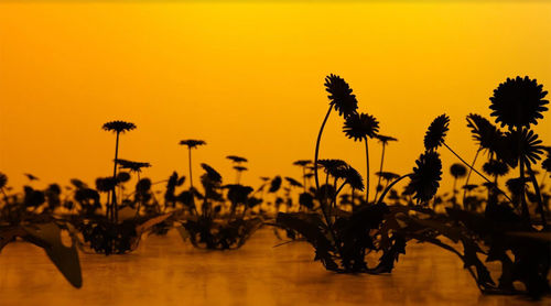 Esmaa Mohamoud, Darkness Doesn’t Rise To The Sun, But We Do, 2022. Steel, paint, acrylic adhesive, orange sunset glow, dimensions variable.