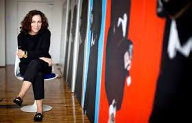 Deborah Kass at her studio in Brooklyn. Her first retrospective, at the Andy Warhol Museum in Pittsburgh, features three decades’ worth of personal samplings from postwar painting and culture.