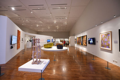 Mohamed Ahmed Ibrahim Tower 3, 2017, Cardboard, leaves, paper, 152 x 43 x 44 cm. Courtesy of the UAE Ministry of Culture and Youth, Bihar Museum and Lawrie Shabibi.