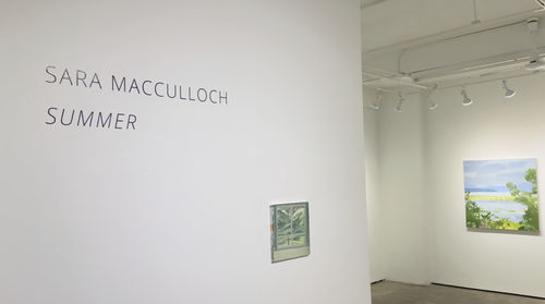 Gallery wall with landscape paintings for Sara MacCulloch: Summer exhibition