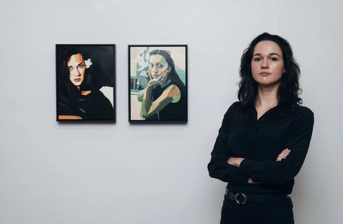 Thea Perkins with her work at N. Smith Gallery