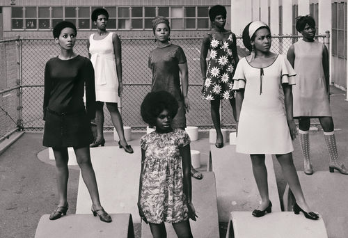 Kwame Brathwaite, "Untitled (Photo shoot at a school for one of the many modeling groups who had begun to embrace natural hairstyles in the 1960s)" (1966).