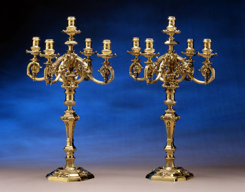 Robert Garrard, A pair of Victorian silver gilt five light candelabra in the George II manner, by Robert Garrard, London,...