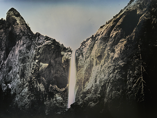 A waterfall is photographed as a daguerreotype 