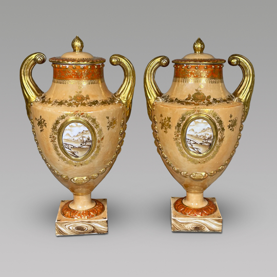 Fine Pair of Chinese Export Porcelain Peach-Toned Covered “Pistol-Handled” Urns