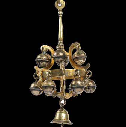 Rattles with bells such as this were worn by children in Spain, hung from the belt as depicted in portraits from the sixteenth and seventeenth century