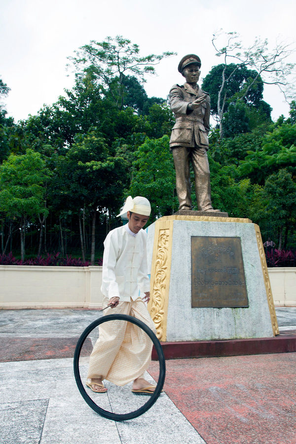 Moe Satt, Bicycle Tire Rolling Event from Yangon: Bogyoke’s Bronze Statue, 2013