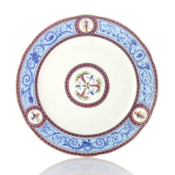 Sèvres Porcelain, A Soft-Paste Sèvres Porcelain Plate with Dark Blue Arabesques on a Pale Blue Ground, 1790