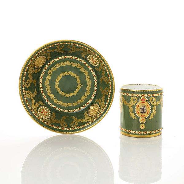 Sèvres Porcelain, A Soft-Paste Sèvres Porcelain 'jewelled' Cup & Saucer with Green Ground, 1781