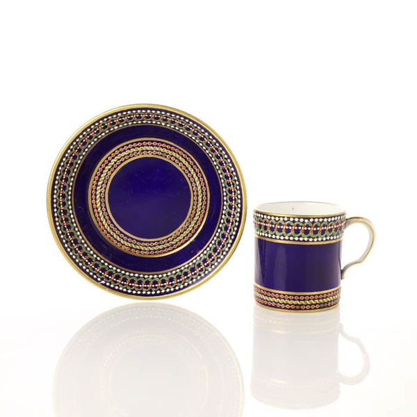Sèvres Porcelain, A Soft-Paste Sèvres Porcelain ‘jewelled’ Cup and Saucer, 1785
