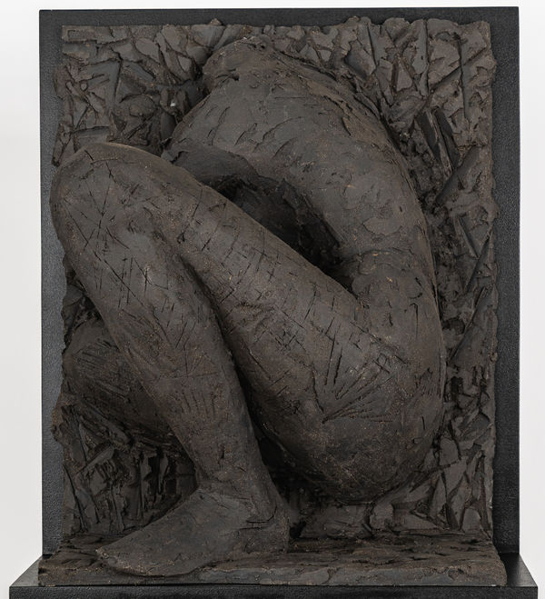 Ceramic relief in black clay in sculptor Emilio DiIorio's Women of Troy series.