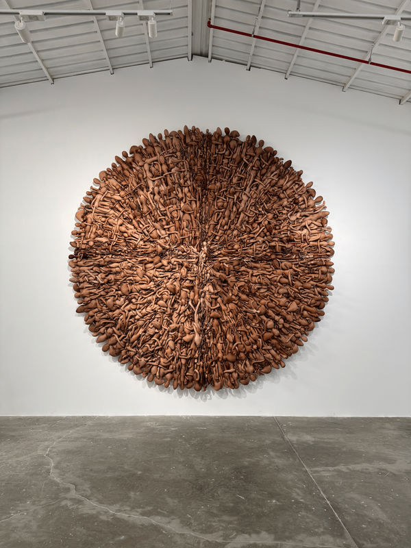 Zahrah Alghamdi Echoes of the One in Many, 2025 Leather on wood 400 x 400 cm