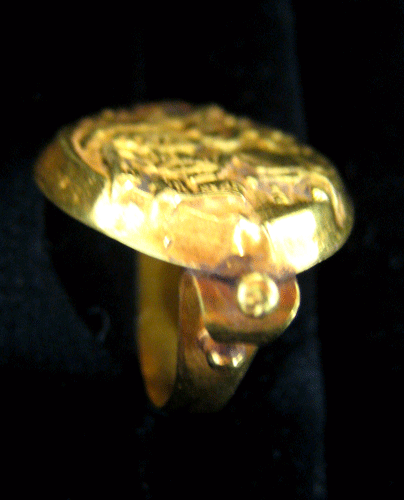 Gold Ring Depicting a Seated Deity