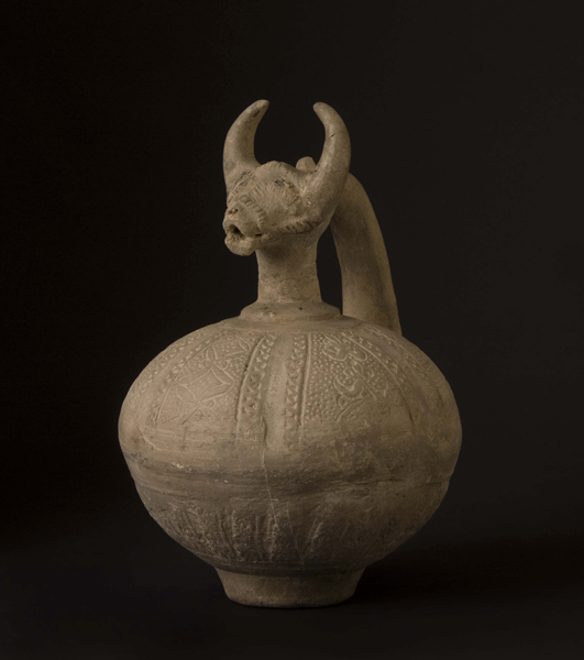 Islamic Terracotta Jug with Molded Decorations