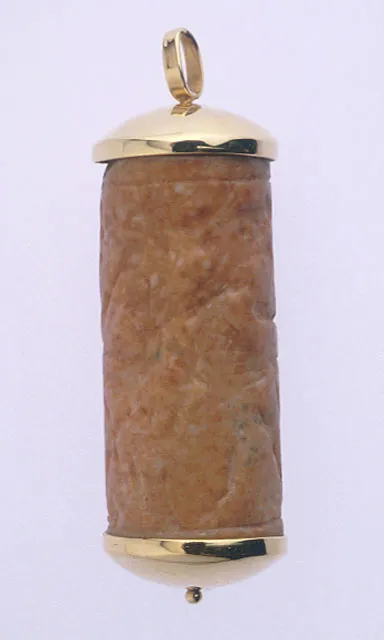 Gold Pendant Featuring a Limestone Cylinder Seal