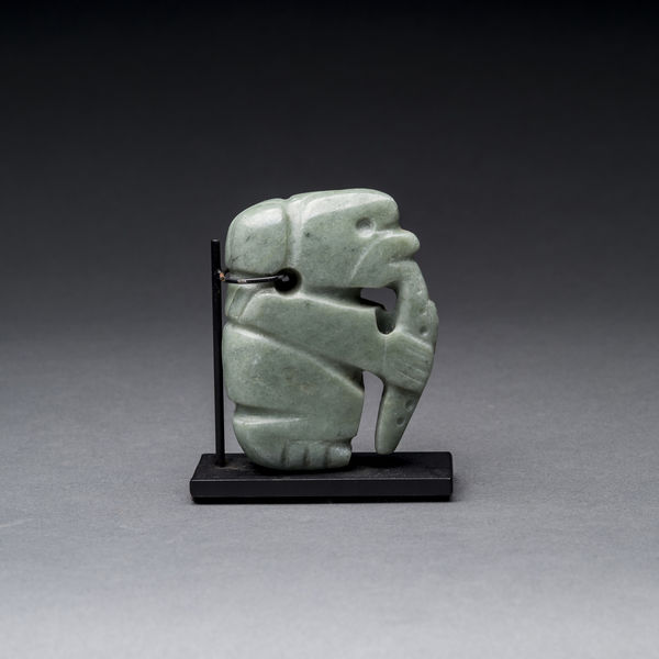 Atlantic Watershed Jade Pendant of a Monkey Eating a Fruit