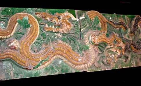Pair of Ming Glazed Terracotta Temple Wall Tiles Depicting Two Dragons