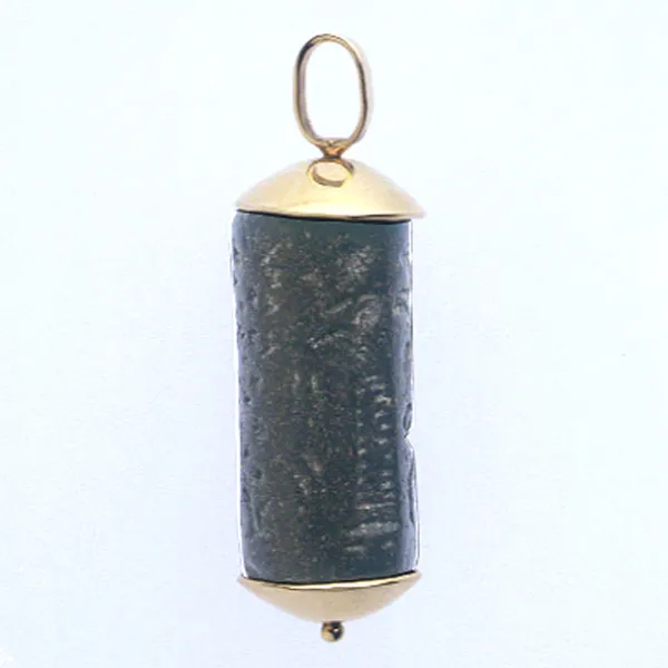 Gold Pendant Featuring a Black Diorite Cylinder Seal