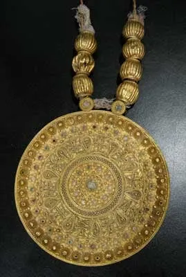 Large Gold Pendant with Applied Decoration