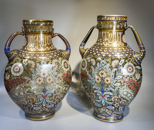 Pair of glass amphora-type vases with floral decoration