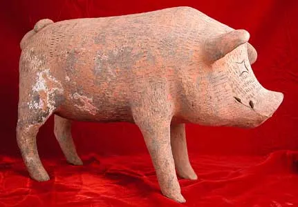 Han Terracotta Sculpture of a Pig with Incised Decorations