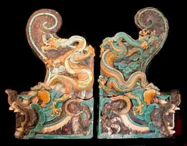 Pair of Ming Glazed Terracotta Architectural Tiles Depicting Dragons