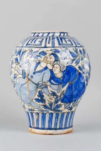 Glazed stonepaste vase with figural scenes among vegetal motifs