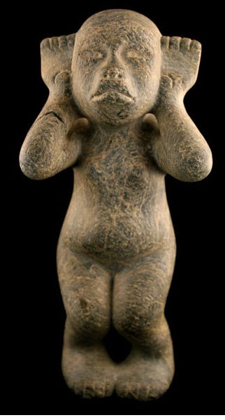 Olmec Stone Figure Holding Her Hands by Her Ears