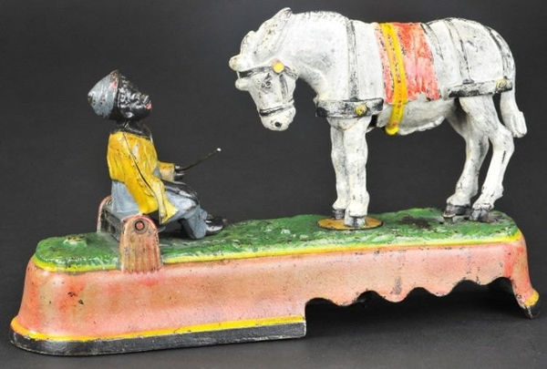 BANKS, "I Always Did 'Spise a Mule" Boy Seated on Bench Mechanical Bank, 1897