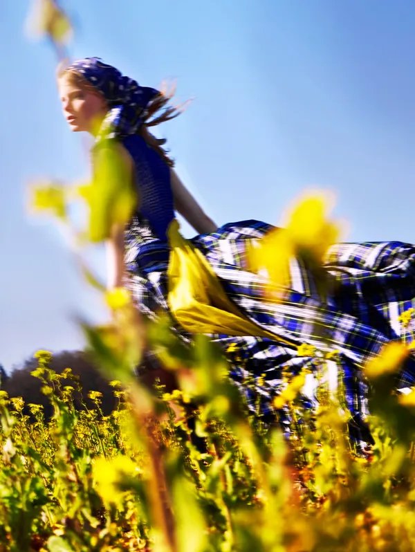Esther Haase, Emily running through the flower field, Baltic Sea, 2020