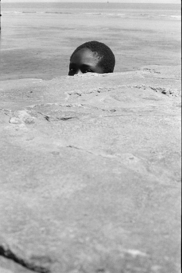 Peeping Sea Wall Beach Boy, Sea Wall, Georgetown, Guyana