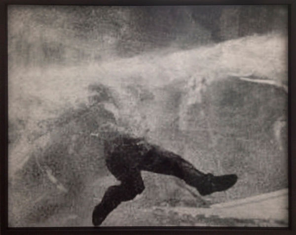 A suspended man hit by a blow about to fall over 2