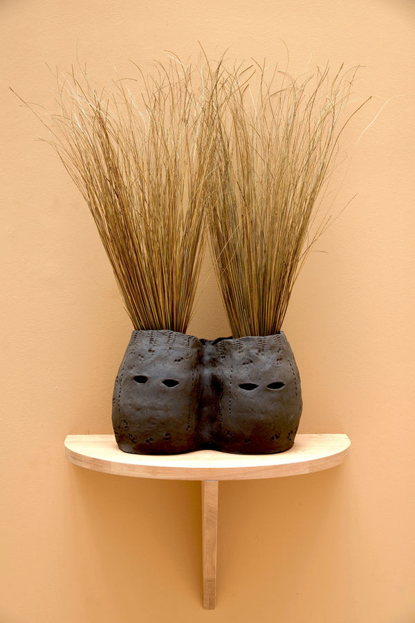 Lucía Pizzani Siamesas, 2024 Black stoneware clay and dried palm stems 36 x 22 x 76 cm 14 1/8 x 8 5/8 x 29 7/8 in