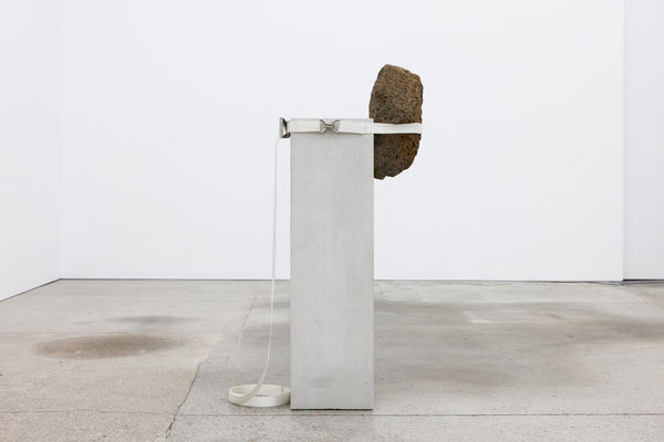 Jose Dávila The Act of Perseverance , 2025 concrete, volcanic rock, and ratchet strap 168 x 42 x 72 cm 66 1/8 x 16 1/2 x 28 3/8 in