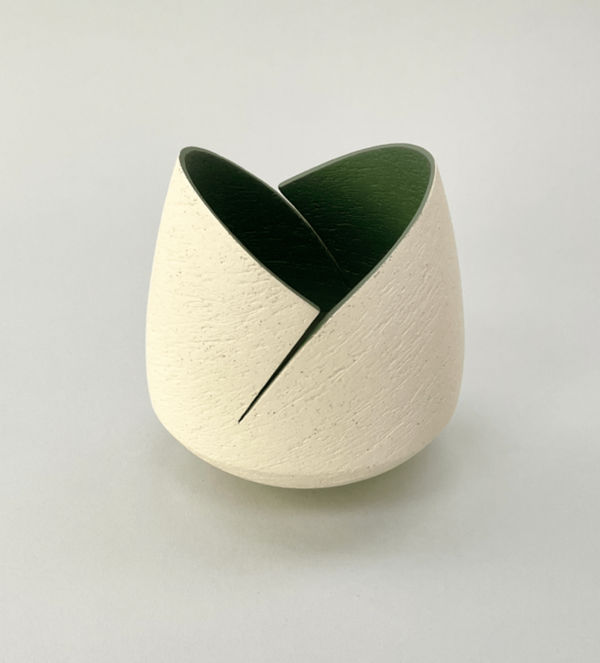 Ashraf Hanna, Ivory cut and altered pinch pot with dark sage interior