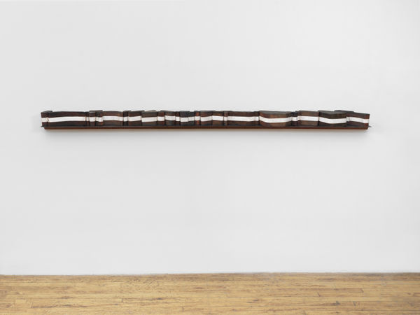 Mel Kendrick White Line, 2019 ebonized mahogany and EPS foam, on steel and mahogany shelf 4 1/2 x 108 x 7 3/4 in (11.4 x 274.3 x 19.7 cm) shelf: 2 x 108 x 7 3/4 in (5.1 x 274.3 x 19.7 cm)