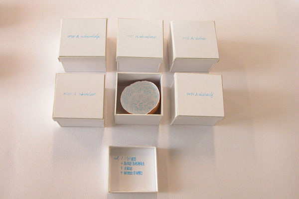 LIU Ren 刘任 White Matrix 白色方阵, 2005 Formboard, half of an eggshell, sign pen, glue 模型纸板，半个鸡蛋壳，签字笔，胶水 5 x 5 x 4 cm (box）, 100 eggshell 5 x 5 x 4 cm (盒子）100个蛋壳