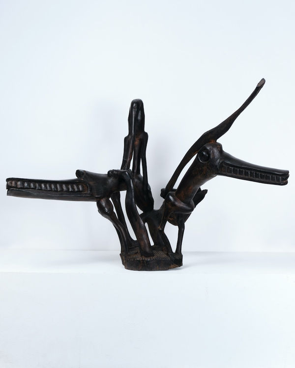 African, Carved abstract animal sculpture