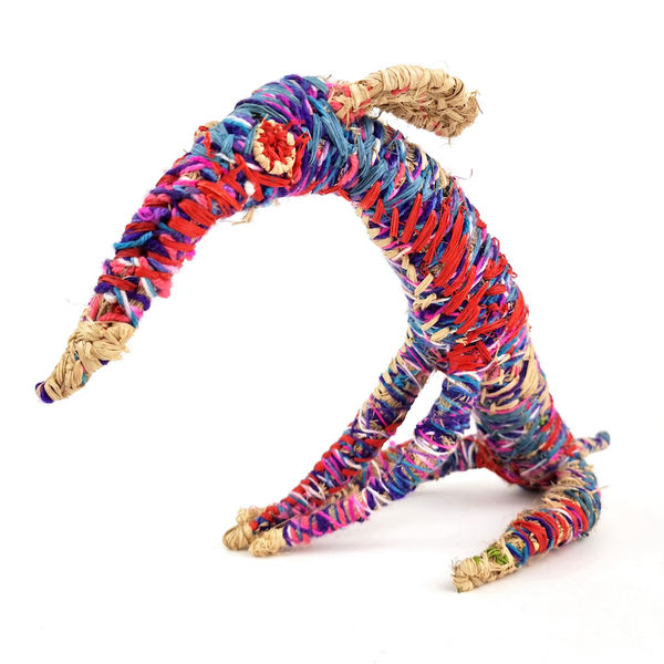 Cynthia Burke Papa (Dog), 2022 tjanpi (grass), acrylic wool, raffia 30 x 50 x 25 cm 11 3/4 x 19 3/4 x 9 7/8 in