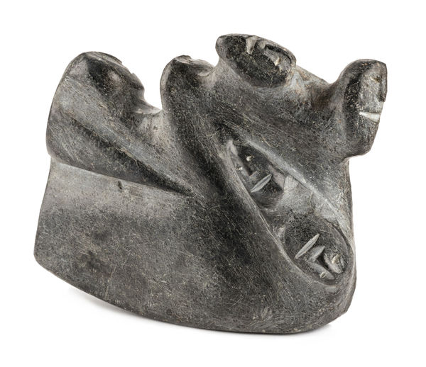 Lot 38 LUCY TASSEOR TUTSWEETOK (1934-2012) ARVIAT (ESKIMO POINT) Family Group, mid 1970s stone, 5 x 7 x 1.5 in (12.7 x 17.8 x 3.8 cm) ESTIMATE: $4,000 — $6,000 PRICE REALIZED: $4,080.00