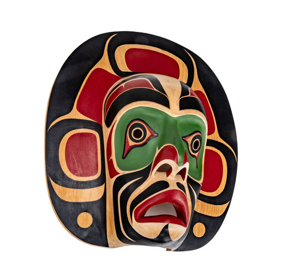 Lot 16 CHARLIE JOHNSON (1964-) KWAKWA̱KA̱ʼWAKW, KINGCOME INLET Southern Kwagiulth Moon Mask, 1990s red cedar and acrylic paint, 14.5 x 13.25 x 5.25 (36.8 x 33.7 x 13.3 cm) ESTIMATE: $500 — $800 PRICE REALIZED: $1,220.00