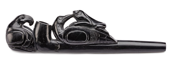 Lot 83 UNIDENTIFIED HAIDA ARTIST Late Trade Pipe, c. 1880-90 stone, 2.75 x 10.25 x 1.5 in (7 x 26 x 3.8 cm) ESTIMATE: $3,000 — $5,000 PRICE REALIZED: $4,080.00