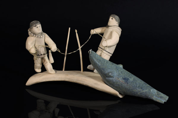 ROMEO EEKERKIK (1923-1983) ARVIAT (ESKIMO POINT) Seal Hunters, mid-late 1970s or early 1980s antler, stone, and sinew, 7 x 14.25 x 4.5 in (17.8 x 36.2 x 11.4 cm)
