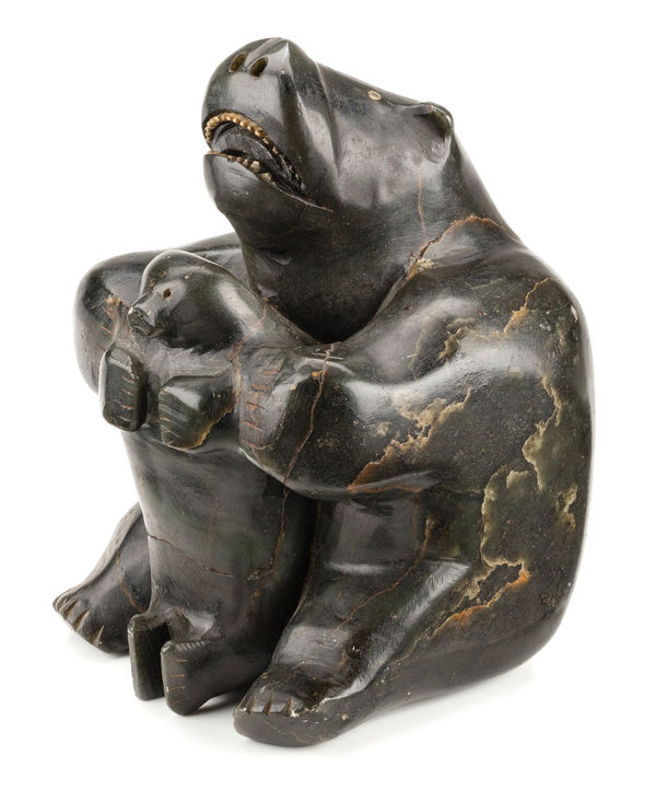 Lot 5 UNIDENTIFIED ARTIST, INUKJUAK (PORT HARRISON) Bear with Captured Seal, c. early to mid 1950s stone and bone 6 x 4.25 x 4.75 in (15.2 x 10.8 x 12.1 cm) ESTIMATE: $4,000 — $6,000 PRICE REALIZED: $4,148.00