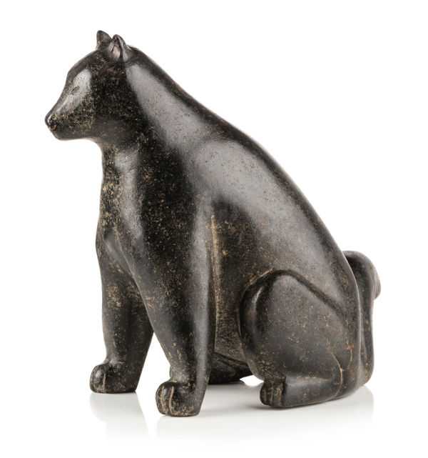 Lot 110 UNIDENTIFIED ARTIST, KINNGAIT (CAPE DORSET) Seated Dog, early 1950s stone, 4.25 x 4 x 2.5 in (10.8 x 10.2 x 6.3 cm) ESTIMATE: $1,200 — $1,800 PRICE REALIZED: $1,080.00