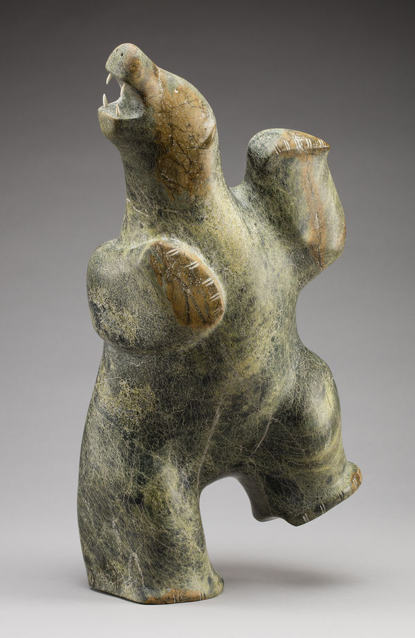 Lot 55 PAUTA SAILA, R.C.A. (1916-2009) KINNGAIT (CAPE DORSET) Dancing Bear, 1980-82 stone and antler, 21.5 x 12.5 x 8 in (54.6 x 31.8 x 20.3 cm) ESTIMATE: $50,000 — $80,000 Price Realized: $54,000