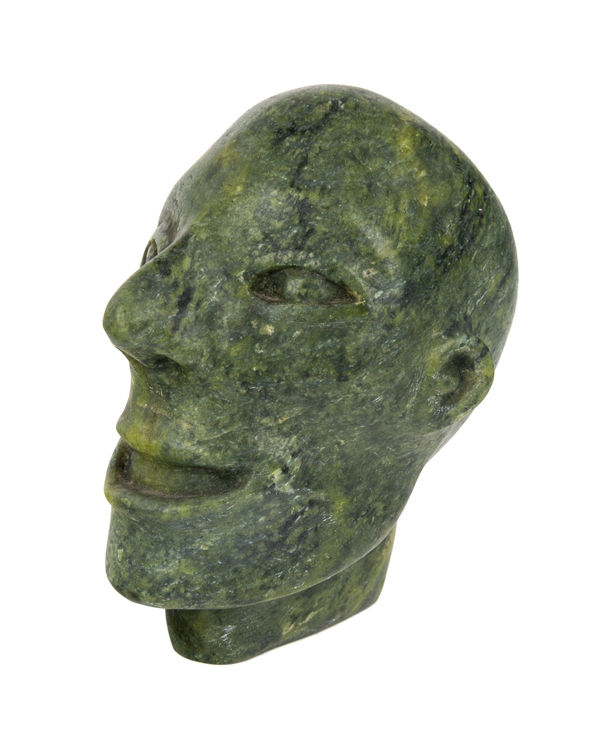 Lot 33 UNIDENTIFIED ARTIST, KINNGAIT (CAPE DORSET) Smiling Head of a Gaunt Man, late 1950s or early 1960s stone, 4 x 3.25 x 3.5 in (10.2 x 8.3 x 8.9 cm) ESTIMATE: $250 &mdash; $350 PRICE REALIZED: $85.40